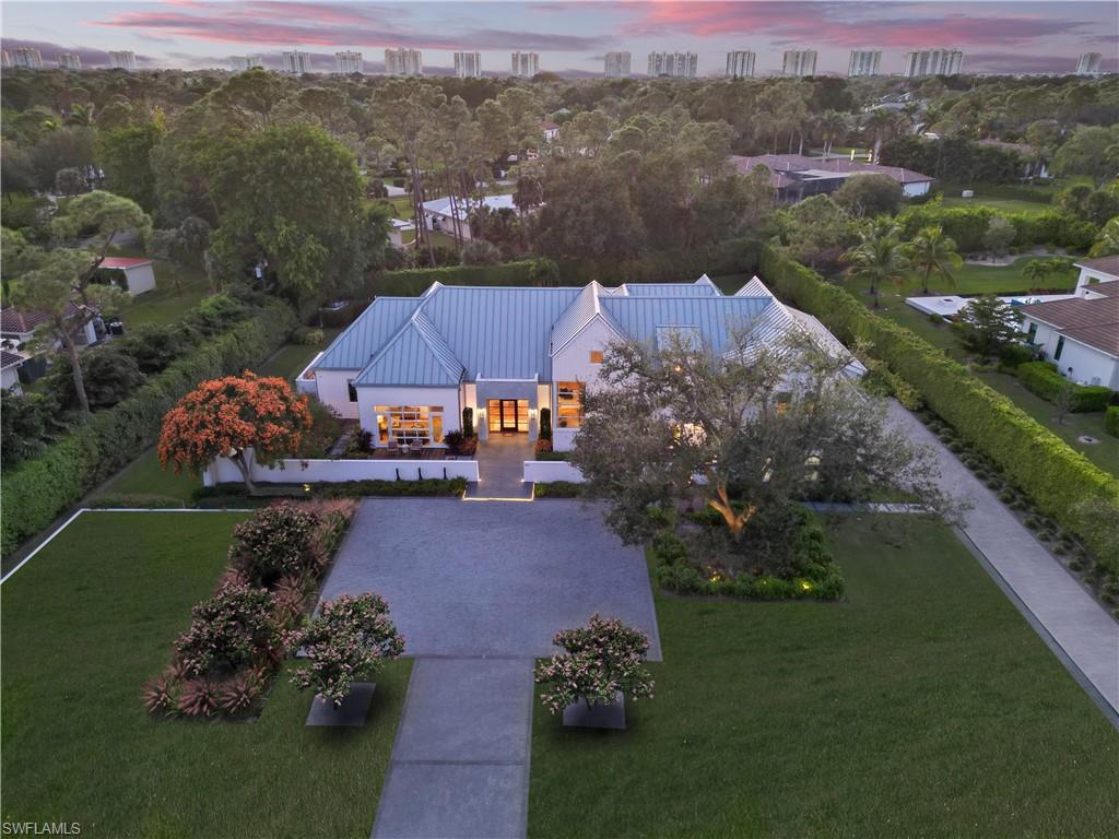 an aerial view of a house with a garden