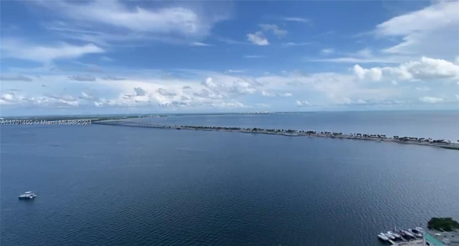 a view of a lake with a city