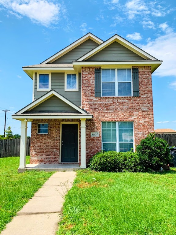 View of front of home with a front lawn