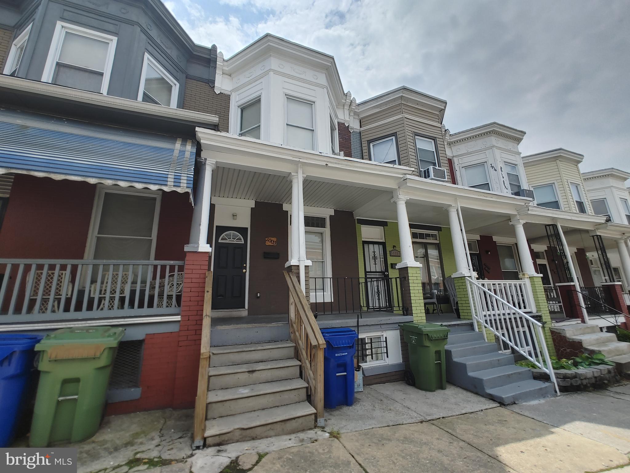 a front view of a house with a porch