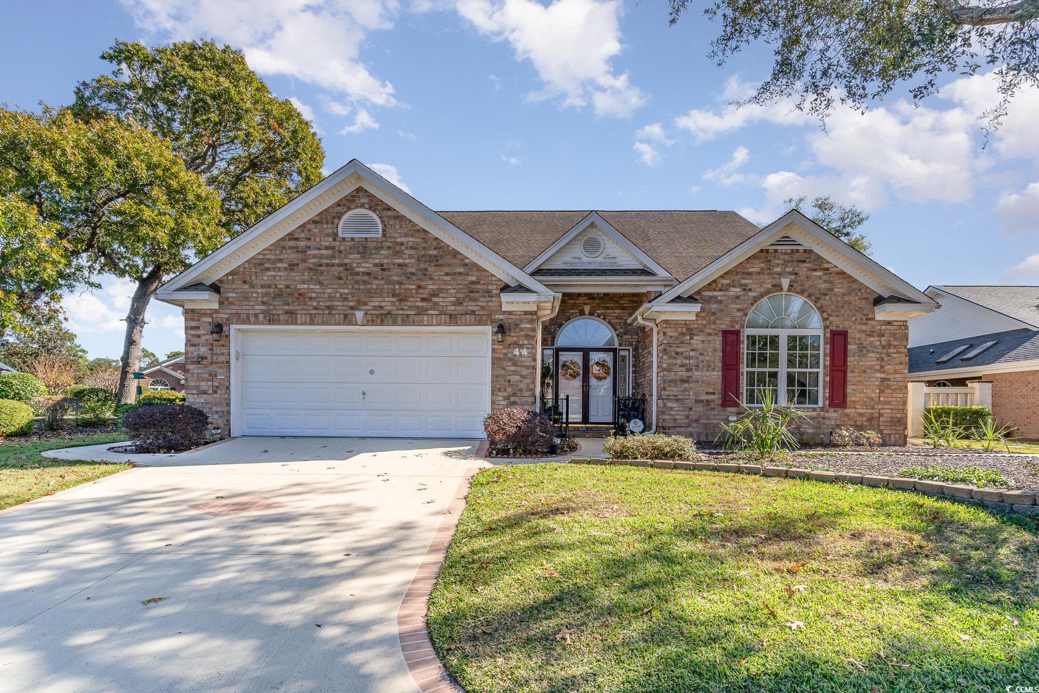 View of front of property featuring a front yard a