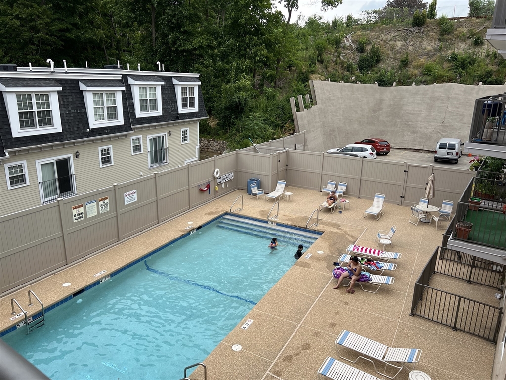 an aerial view of a house having patio