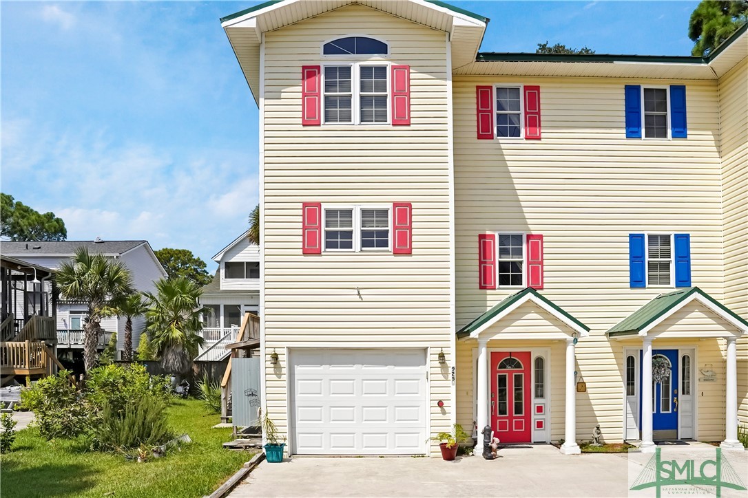 Attached oversized 1 car garage, with a large stor