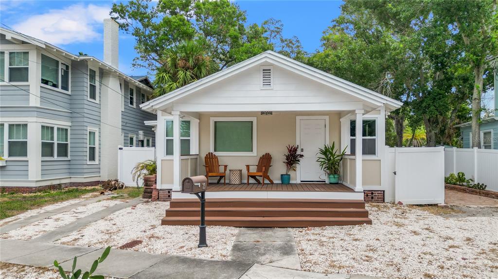 a front view of a house with a porch