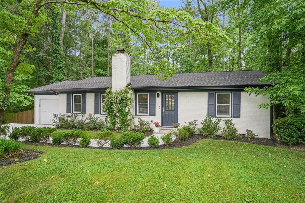 front view of a house with a yard