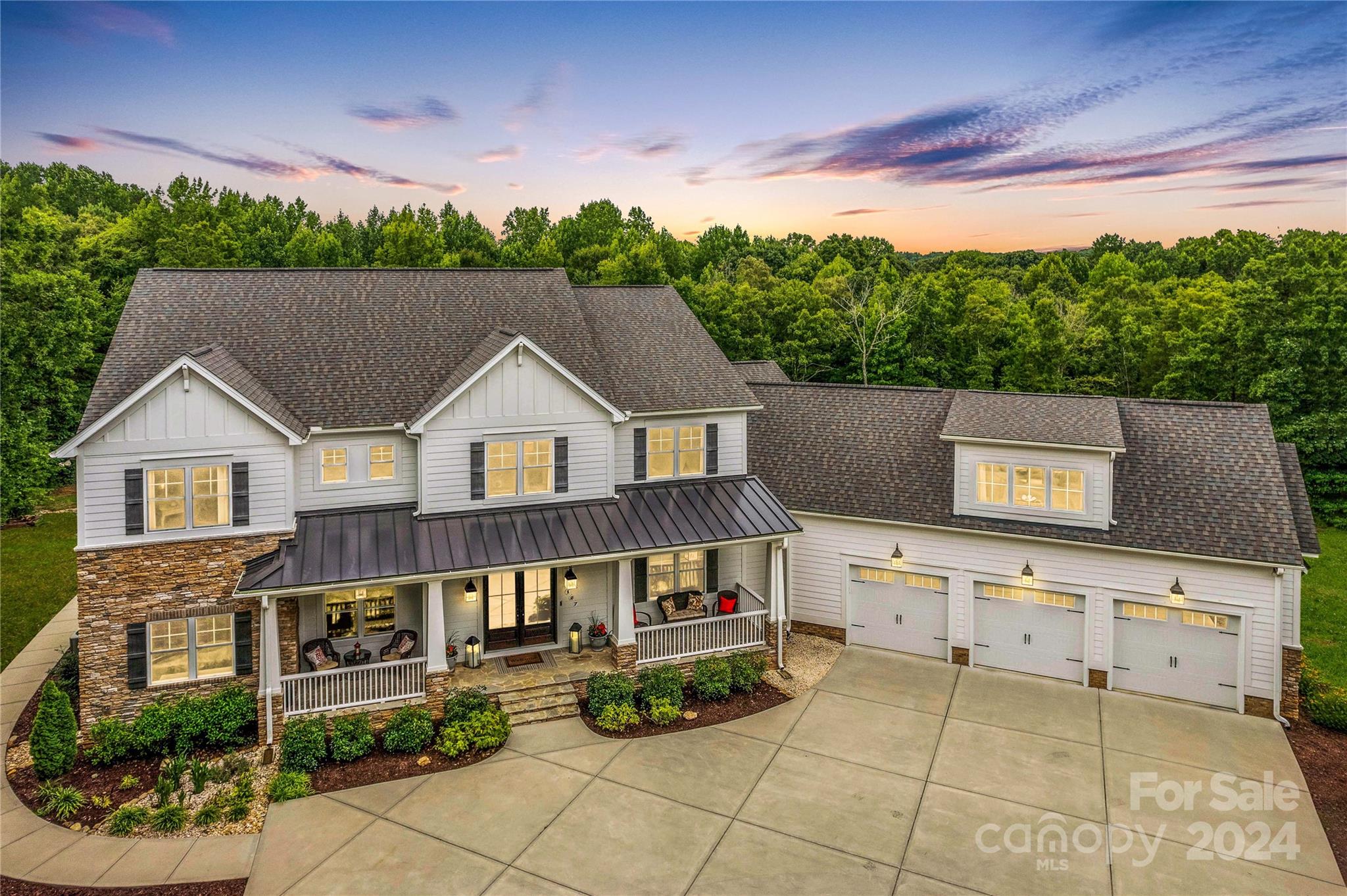 a house view with a garden space