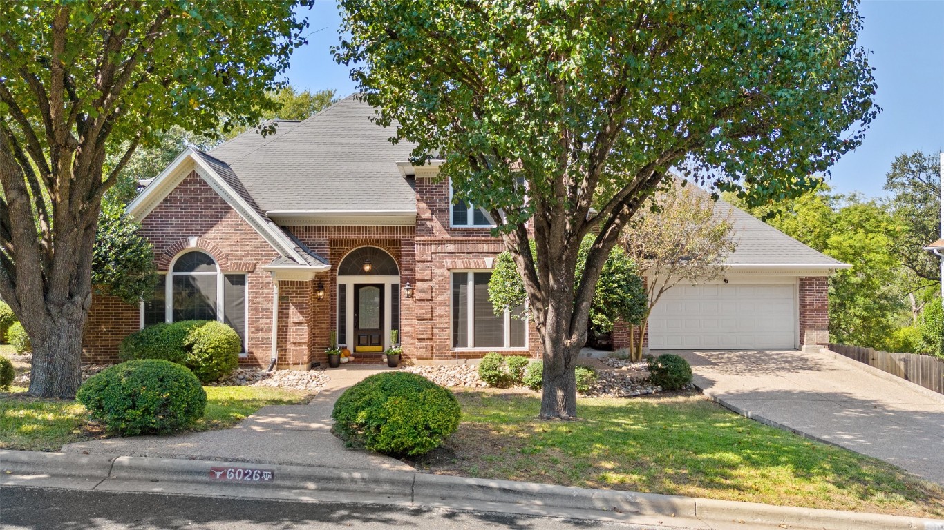 front view of a house with a small yard