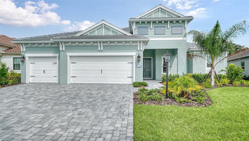 front view of a house with a yard