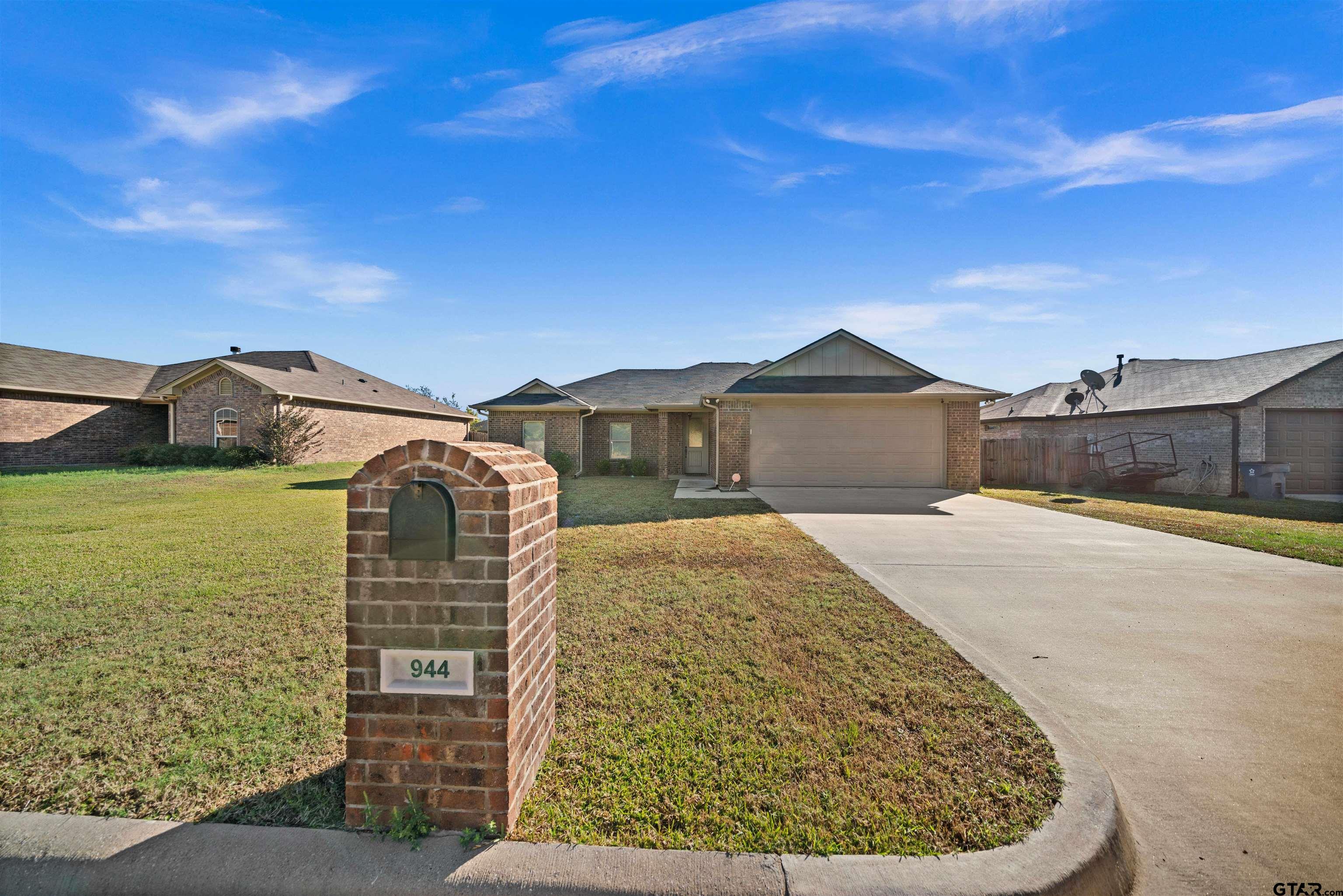 a view of outdoor space yard and front view of a house