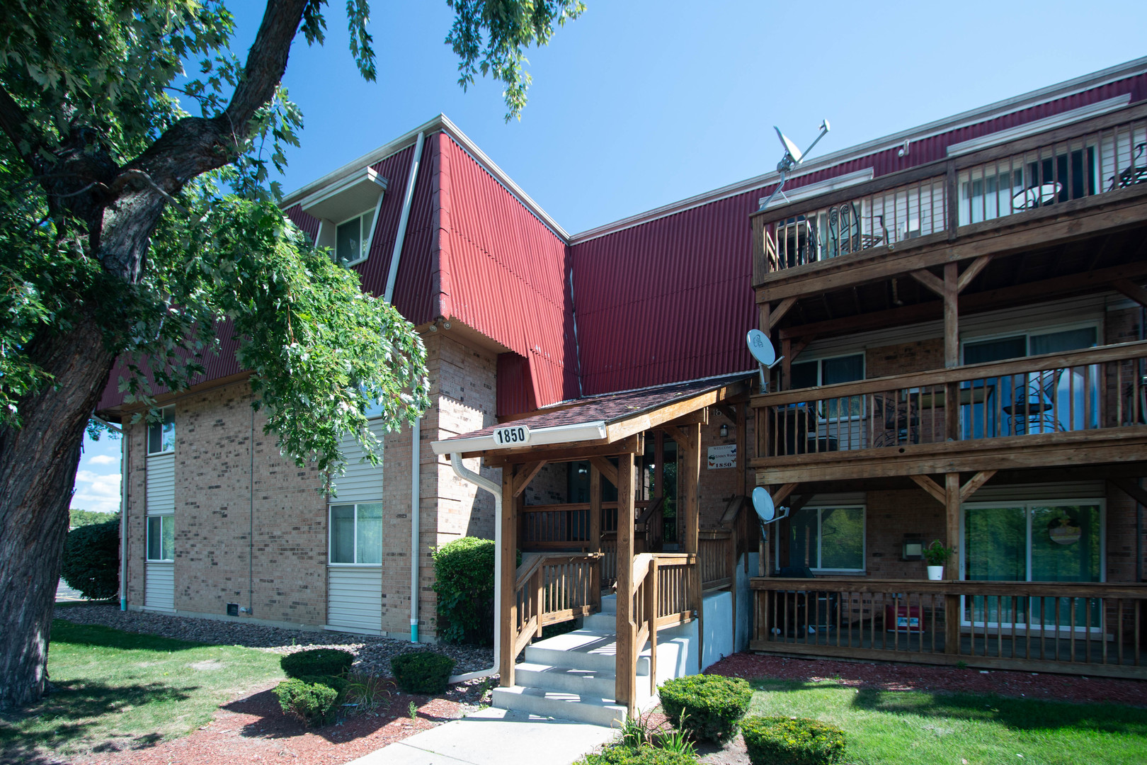 front view of a building with a yard