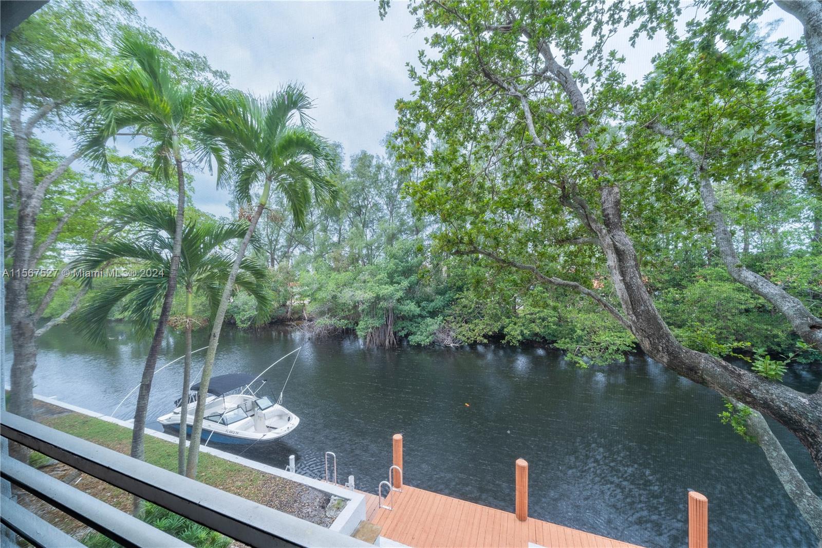 a view of a lake from a balcony