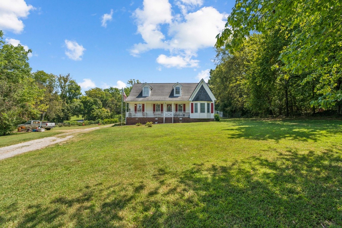 a view of a house with a big yard