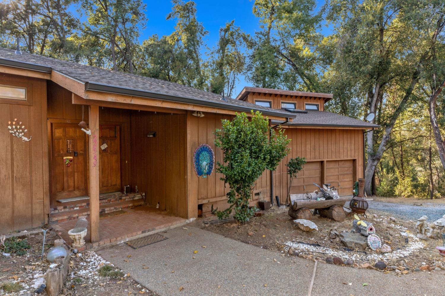 a view of house with outdoor seating space