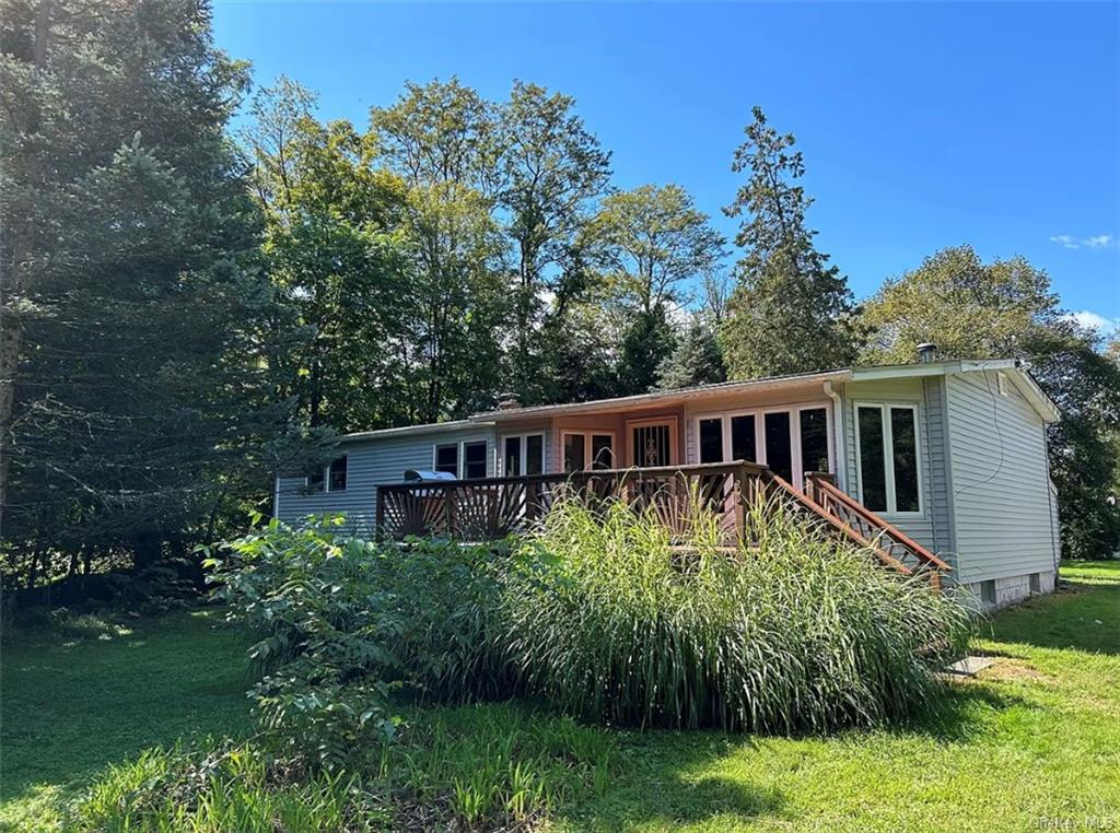 a house with trees in the background