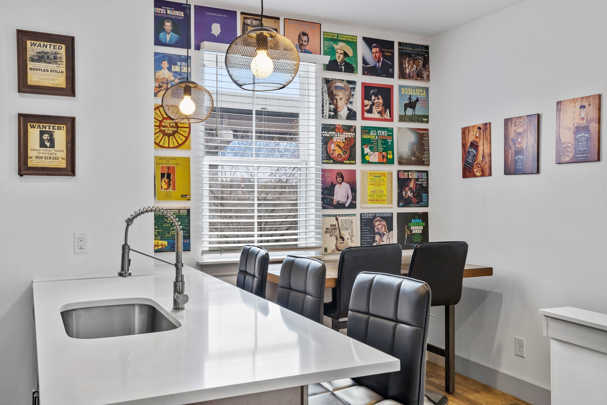 a view of kitchen and dining area with cabinets