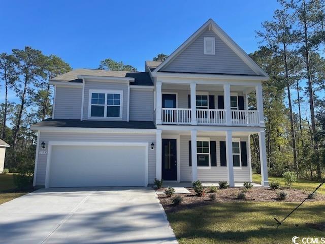 View of front of property with a garage