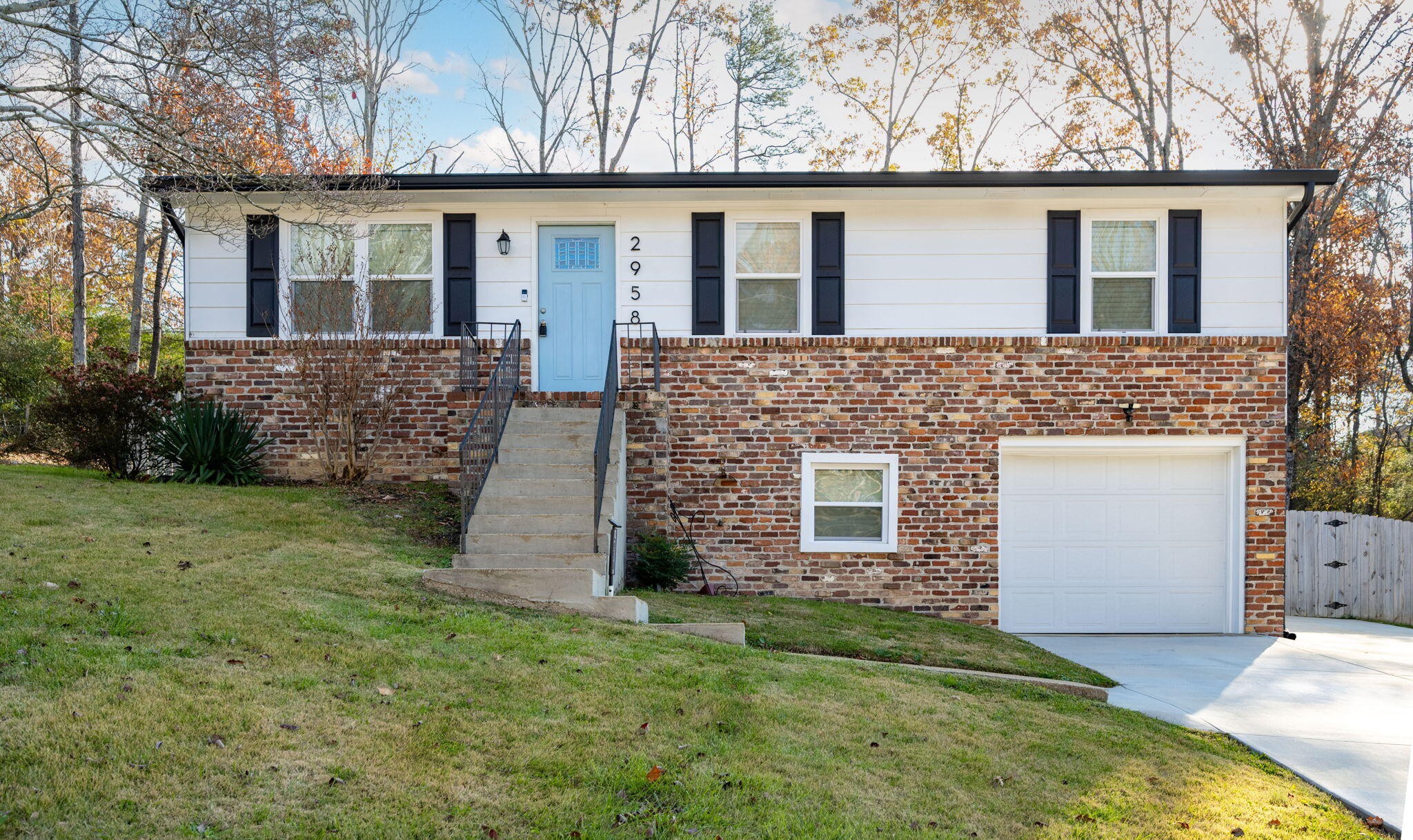 front view of a house with a yard