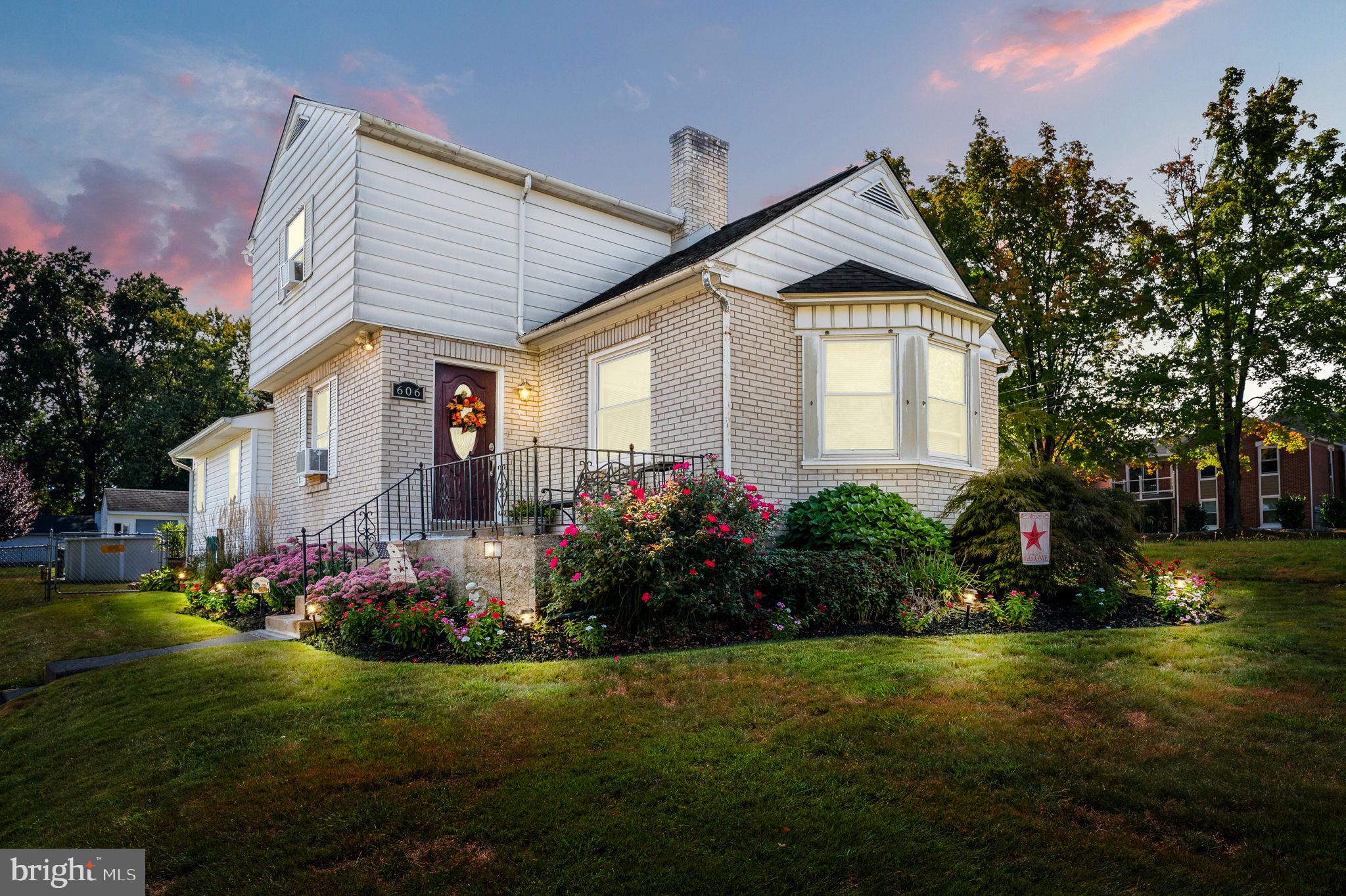 a front view of house with garden