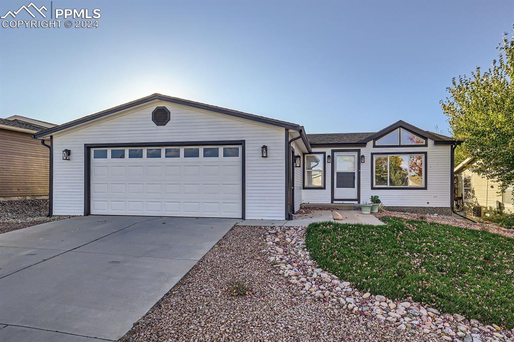 Ranch-style house with a garage