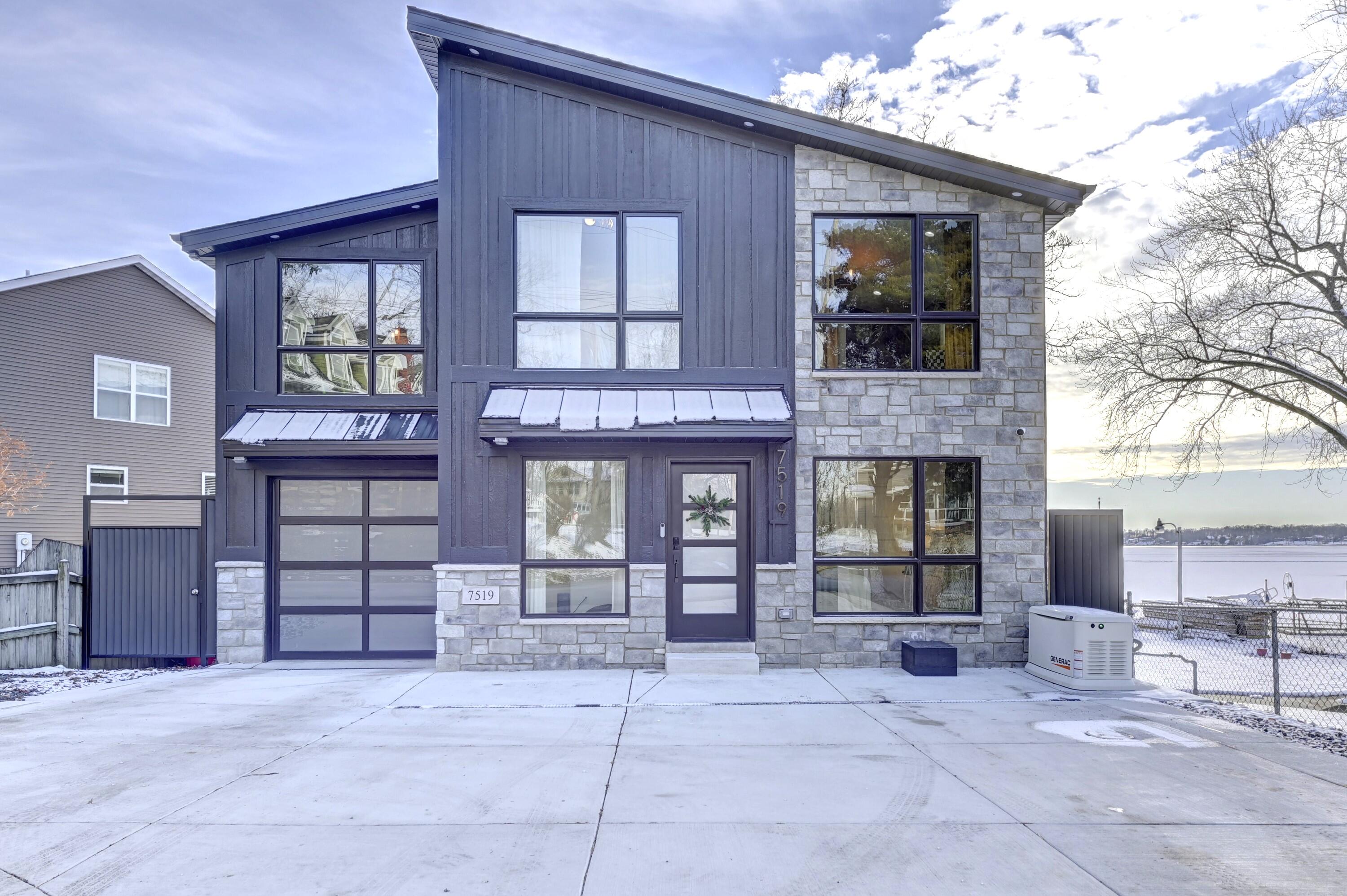 a view of a house with outdoor space and windows