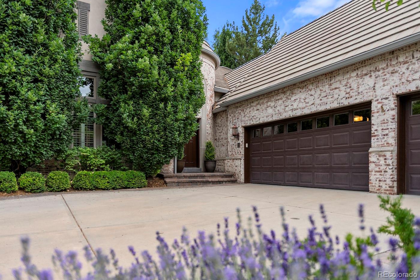 a front view of a house with a garage