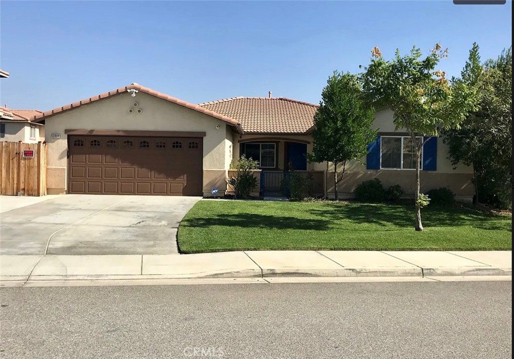 front view of a house and a yard