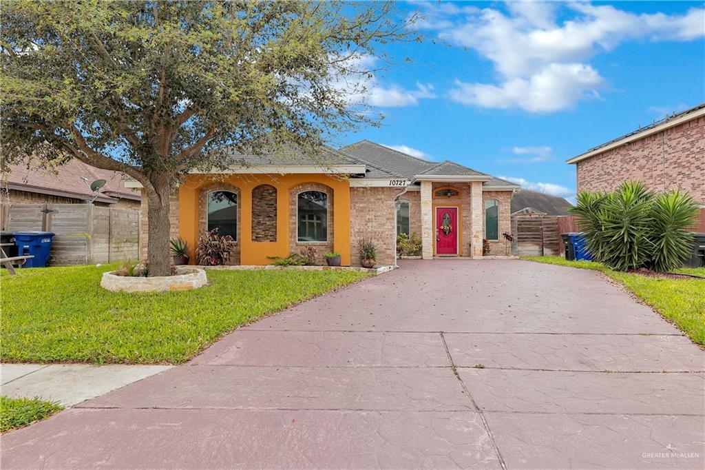 View of front of house with a front yard