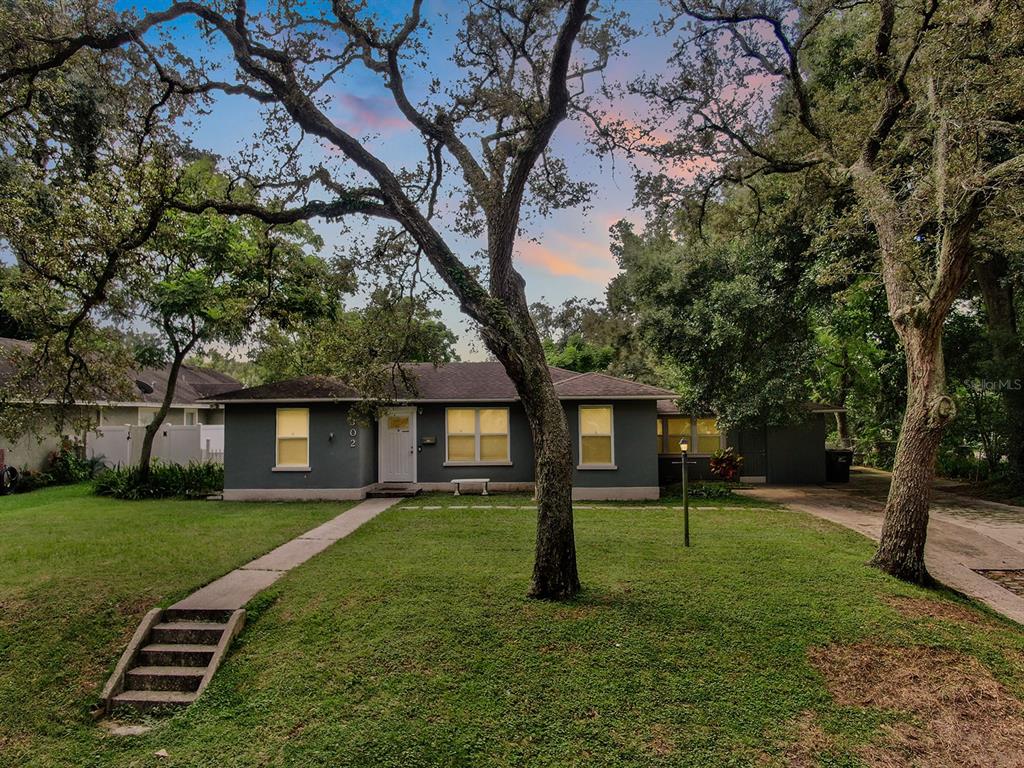 front view of a house with a yard