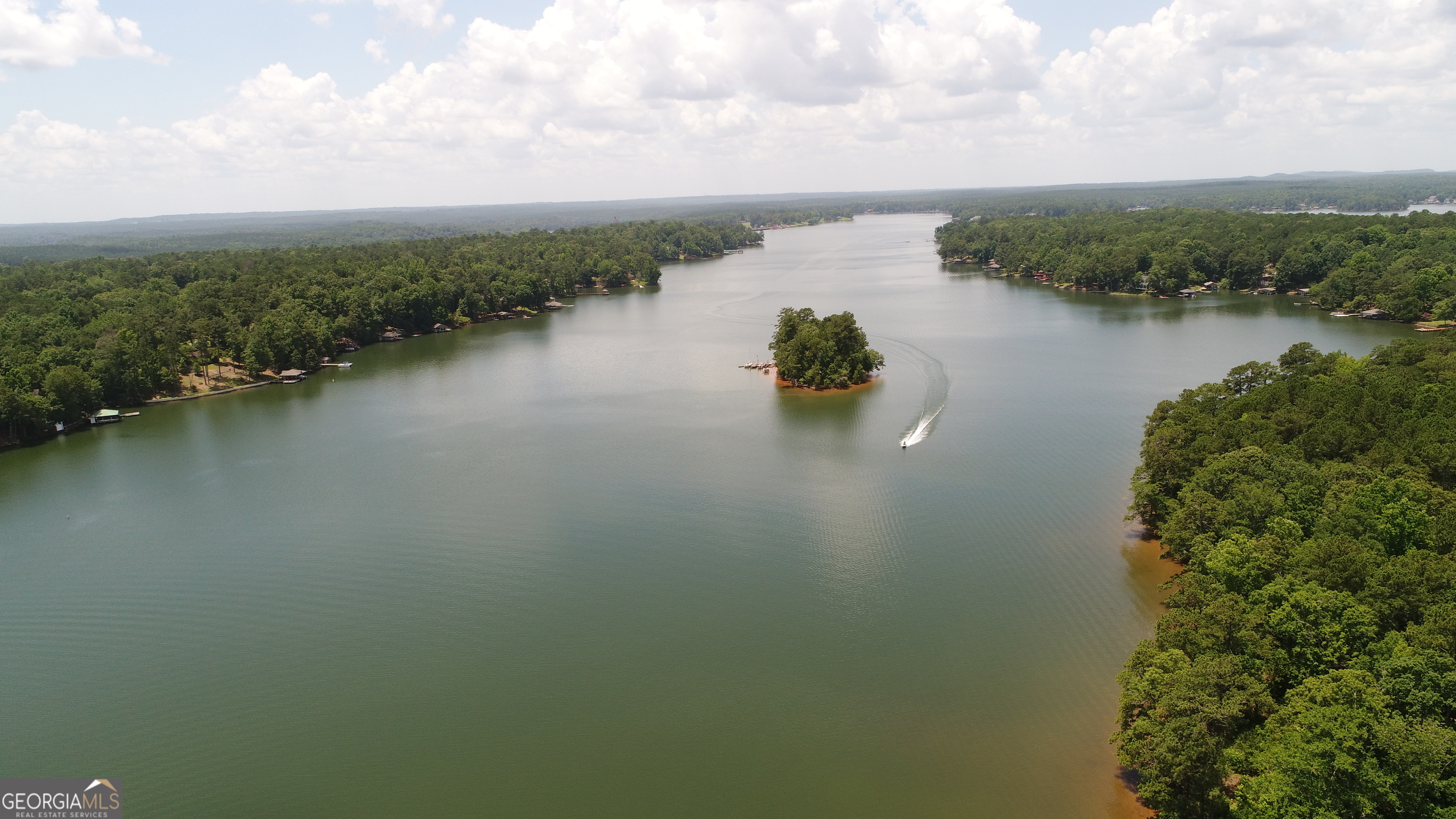 a view of a lake with outdoor space