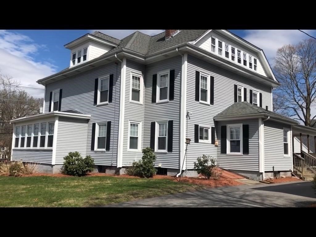 a view of a house with a big yard