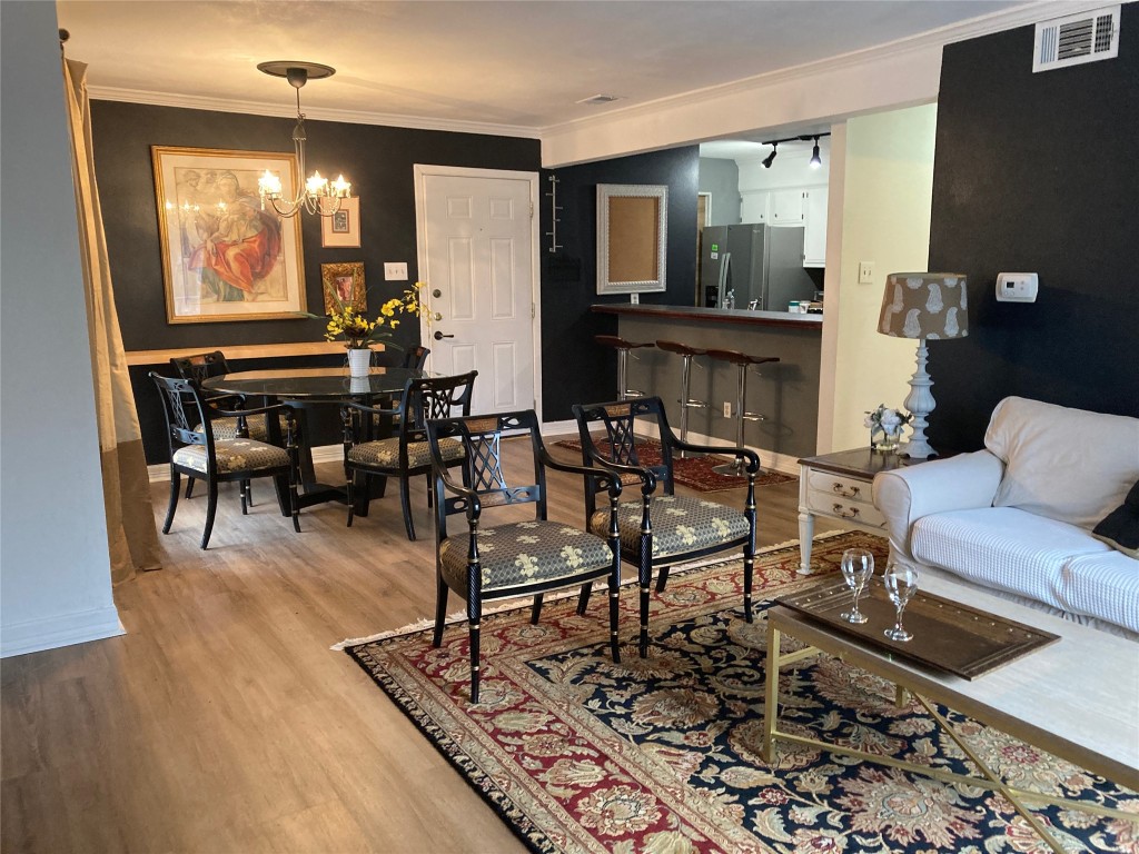 a view of a livingroom and dining room