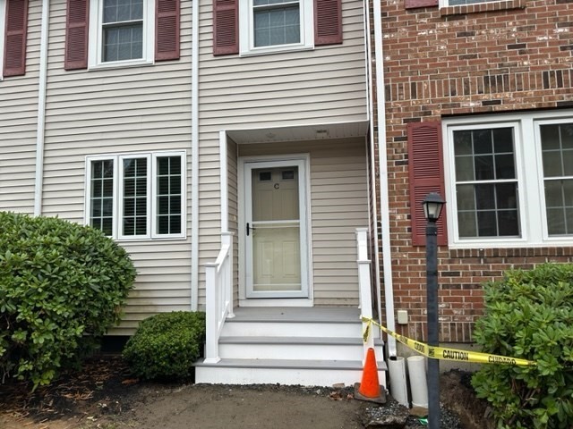 a view of a house with a window and stairs