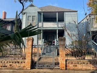 a front view of a house with parking