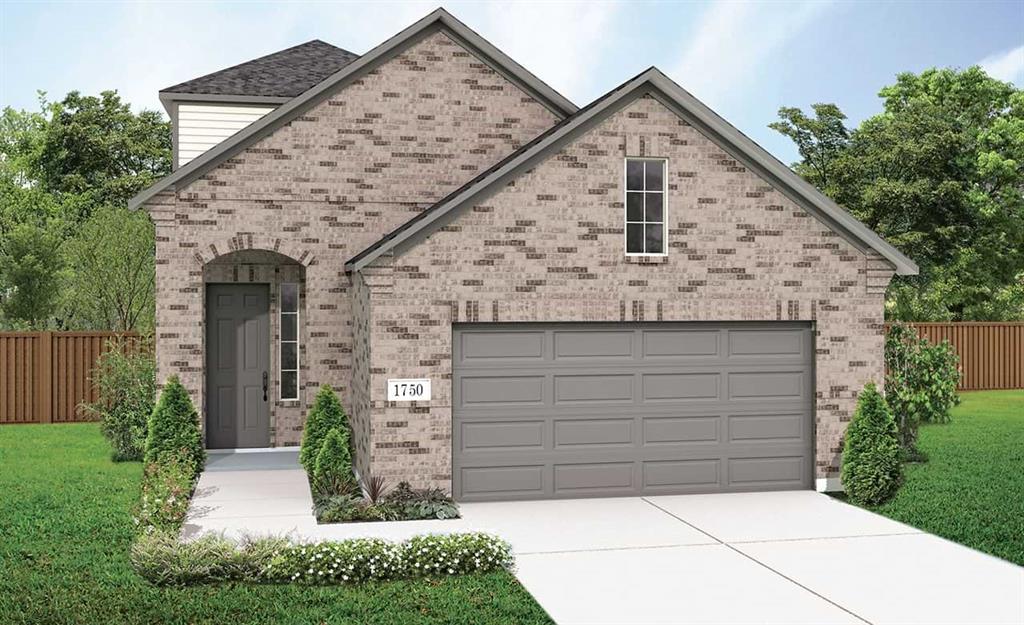 a front view of a house with garage