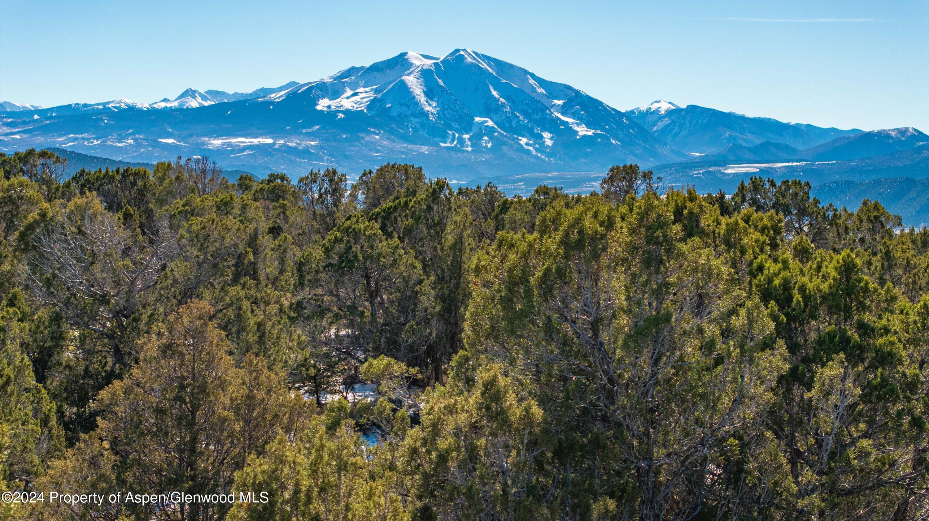 a view of a house with a mountain