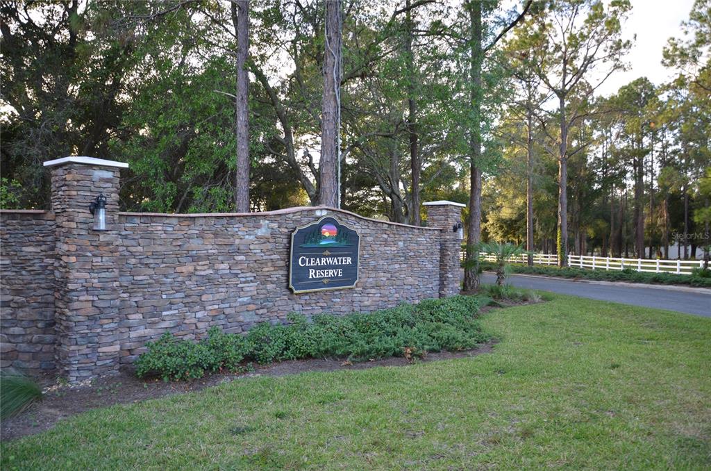 a brick building with a yard