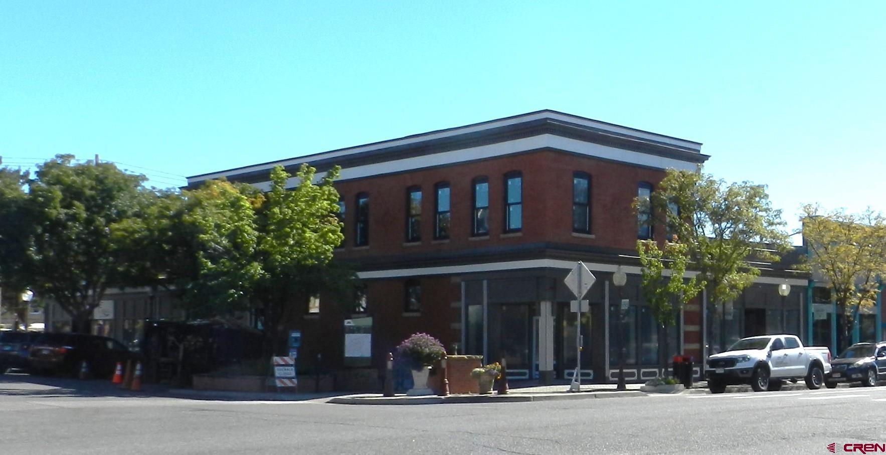 a front view of a house with parking