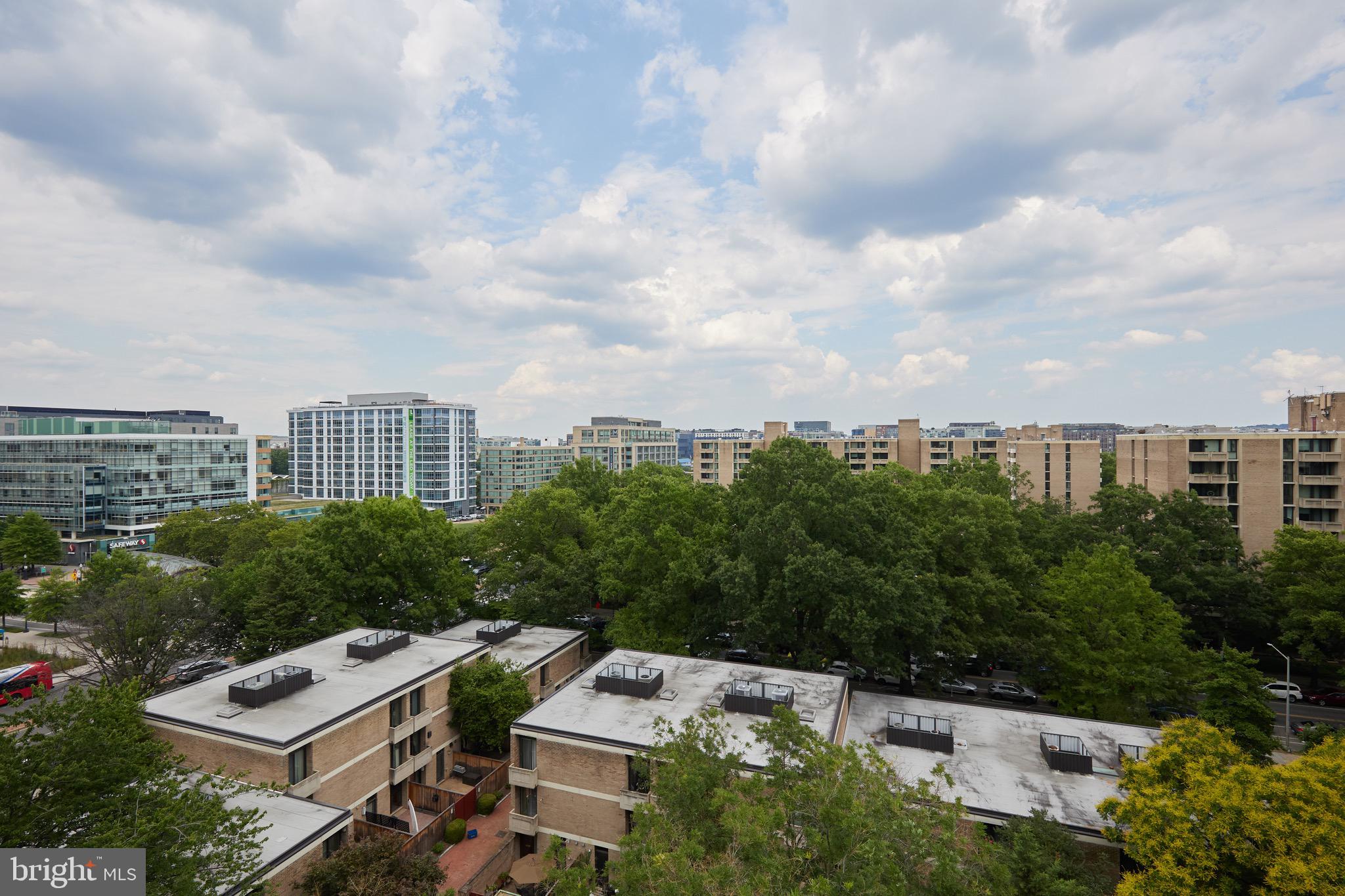 a view of a city with tall buildings