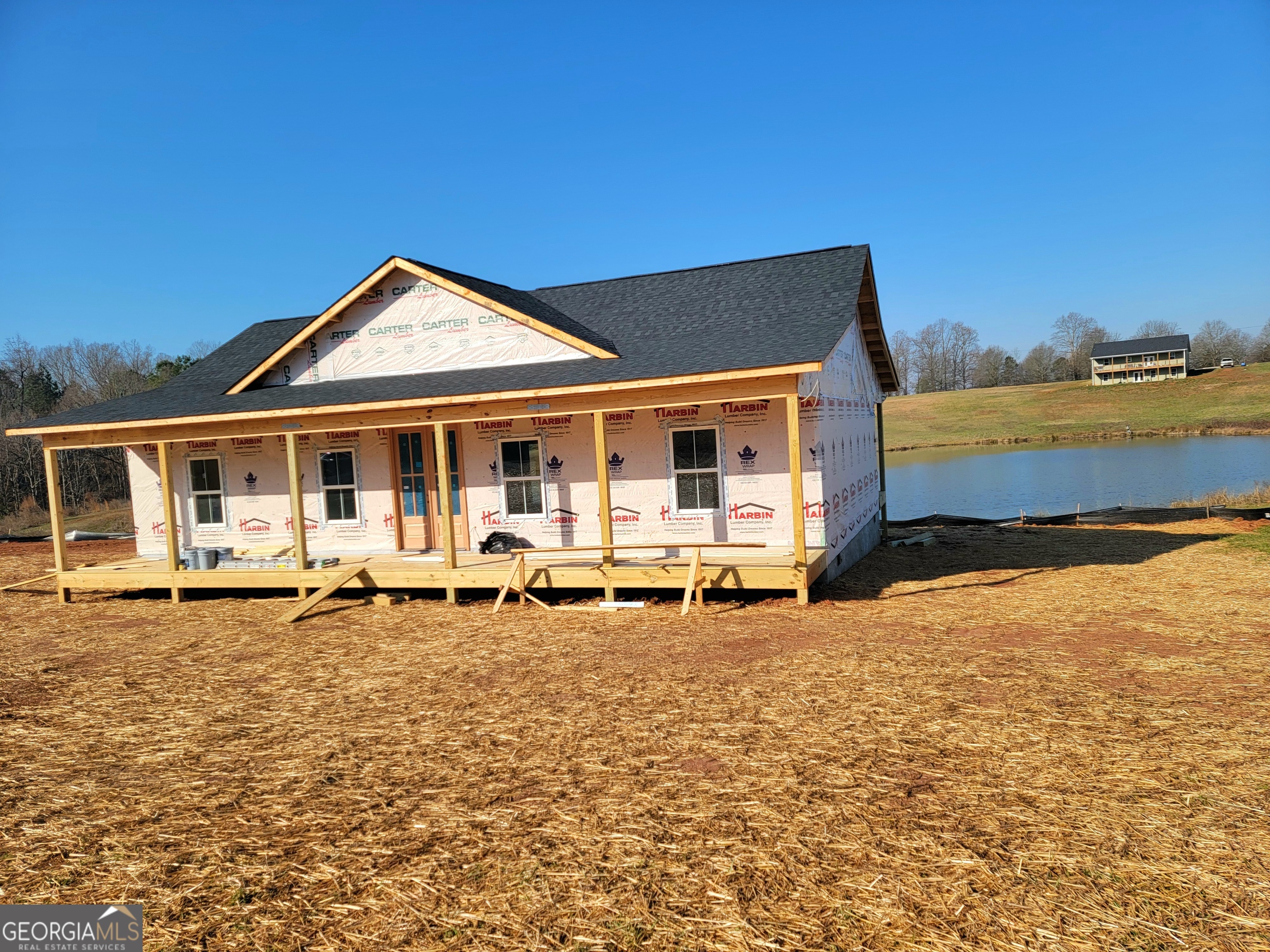 a front view of a house with a ocean view