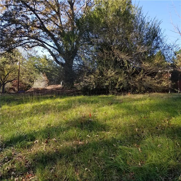 a view of outdoor space with deck and yard