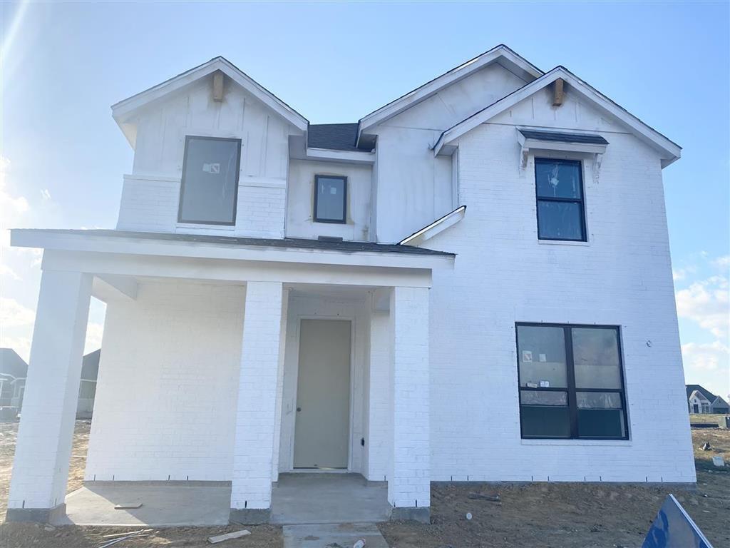 a front view of a house with windows