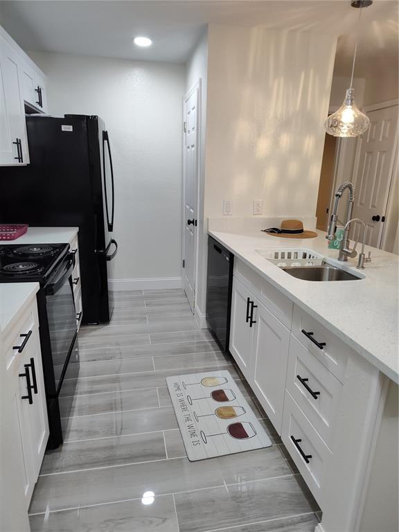 a bathroom with double vanity and a mirror