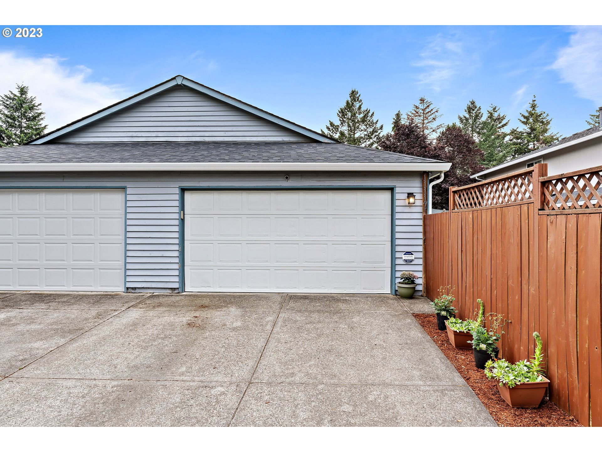 a front view of a house with a garage