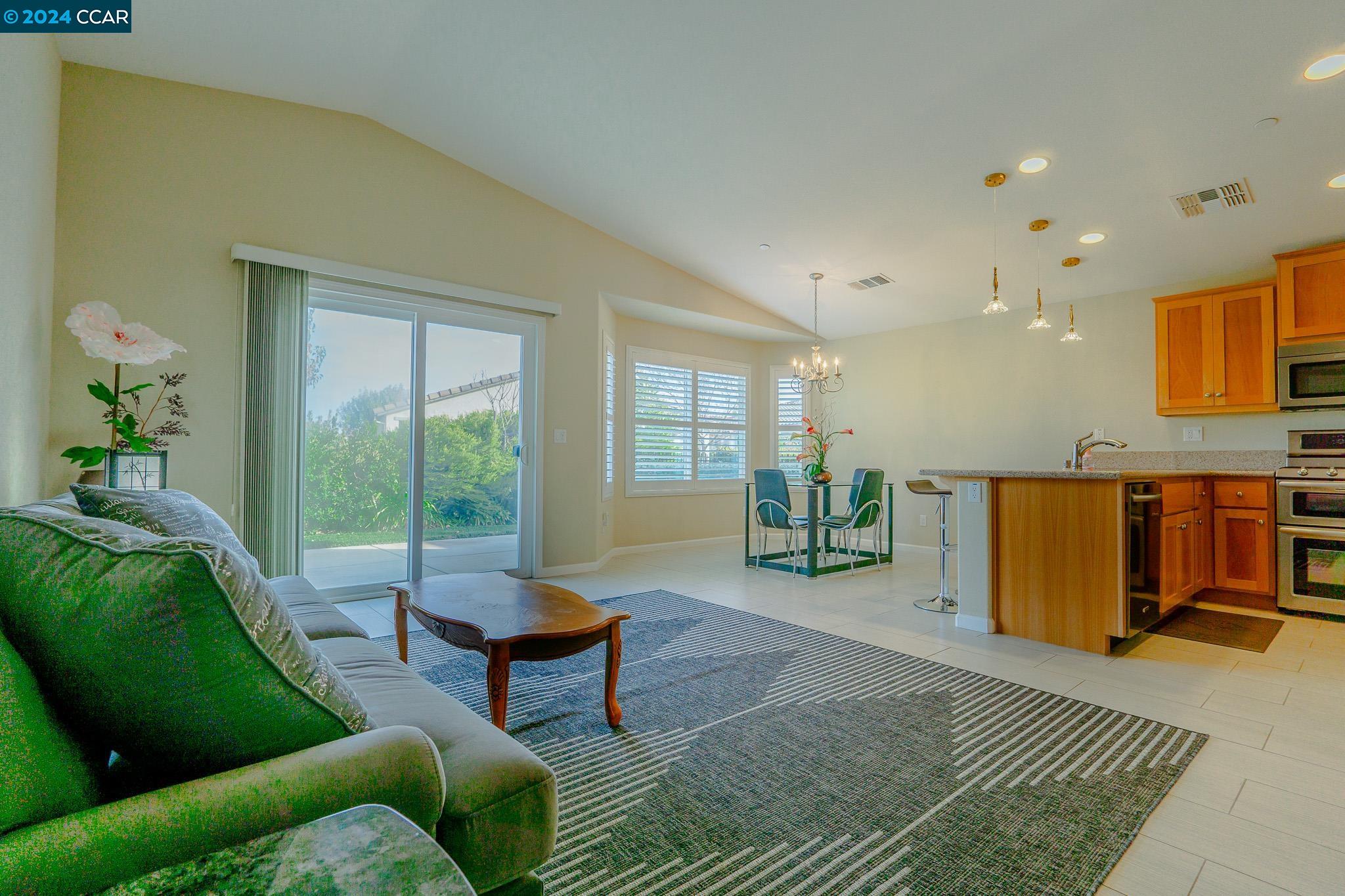 a living room with furniture and a couch