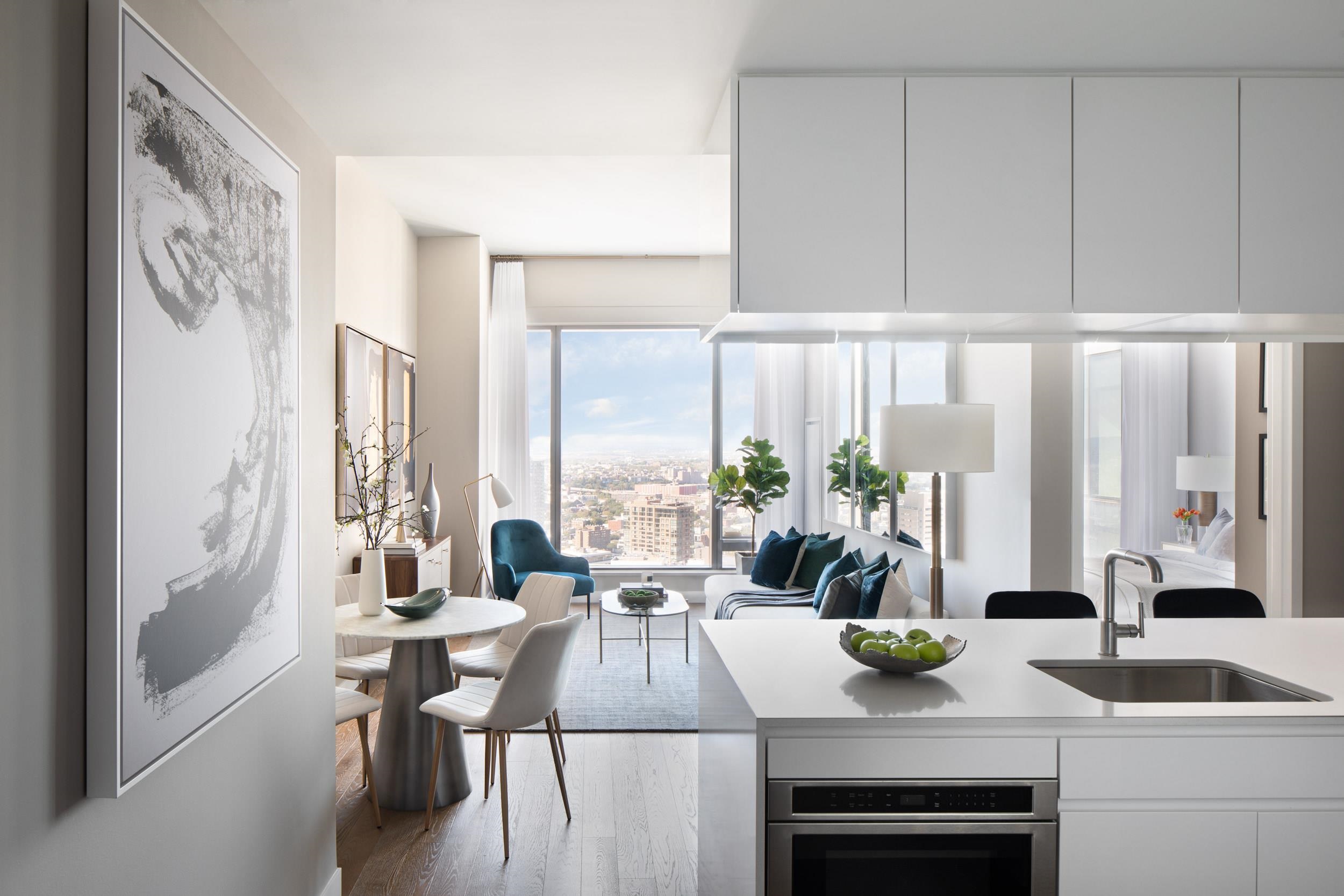 a view of living room with furniture and floor to ceiling window