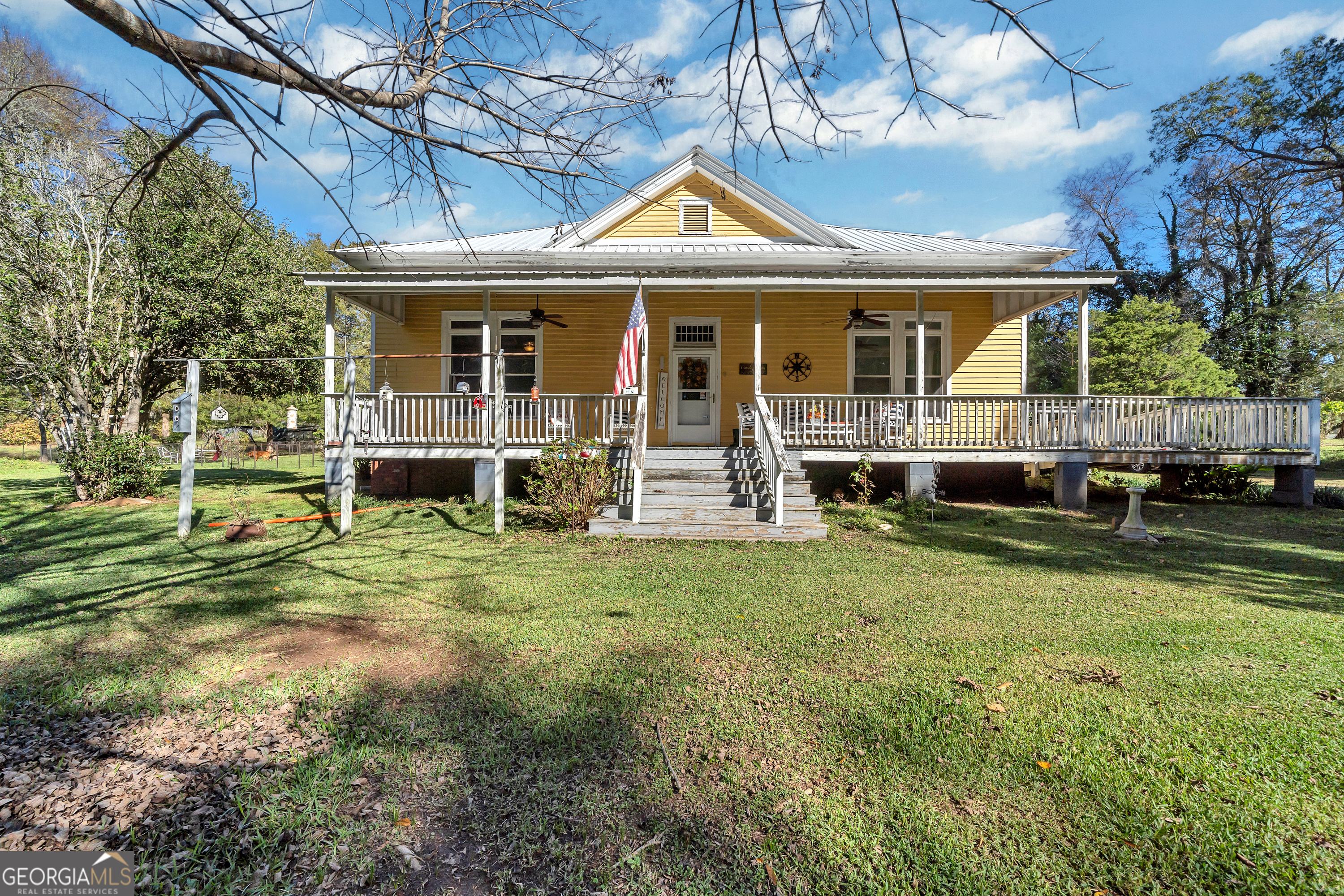 front view of a house with a yard