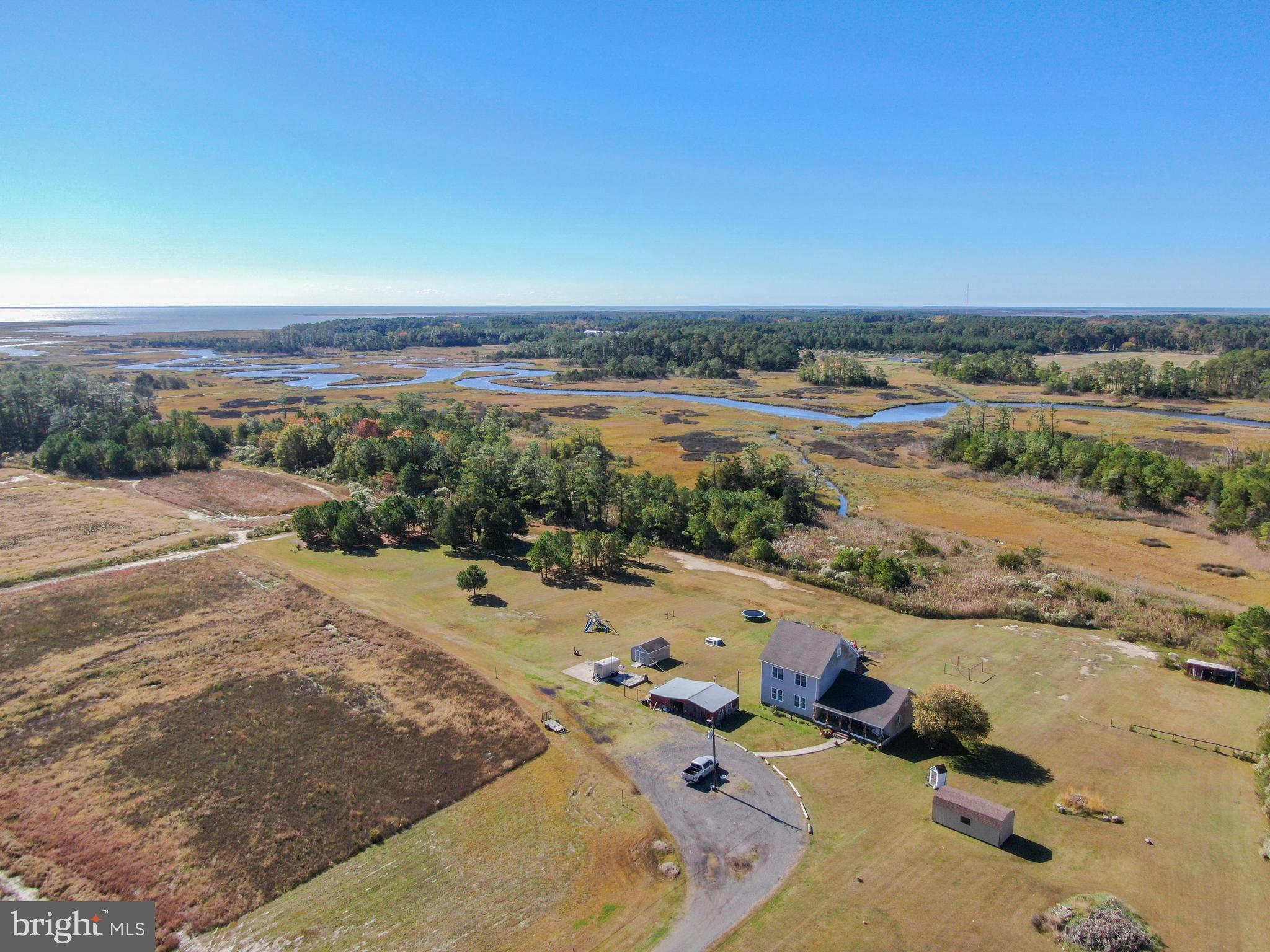 an aerial view of beach and ocean