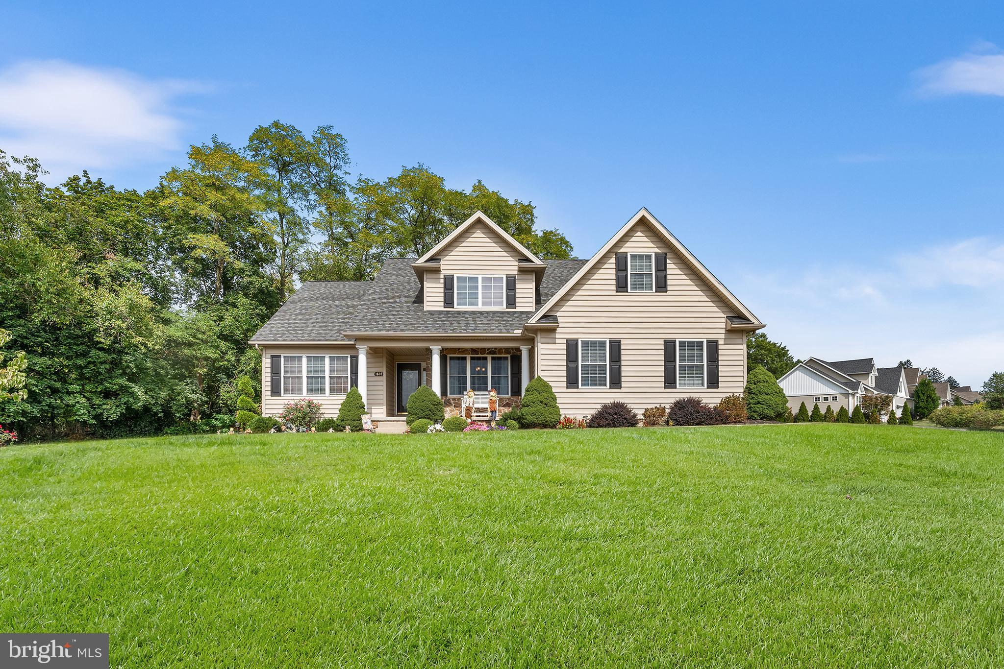 a view of a house with a big yard