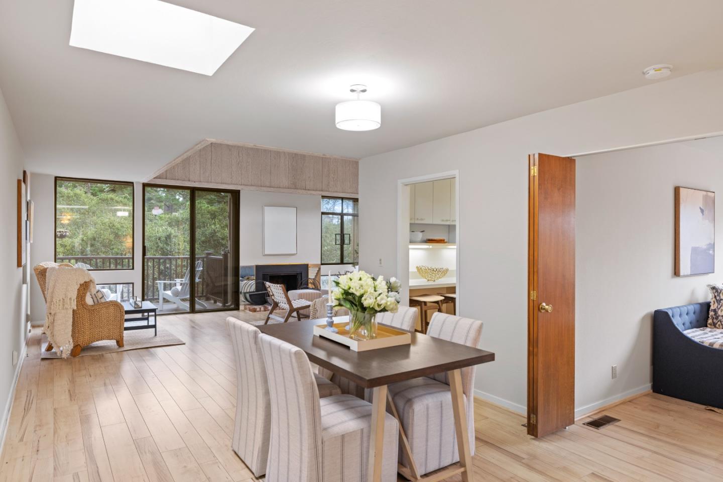 a view of a living room and dining room