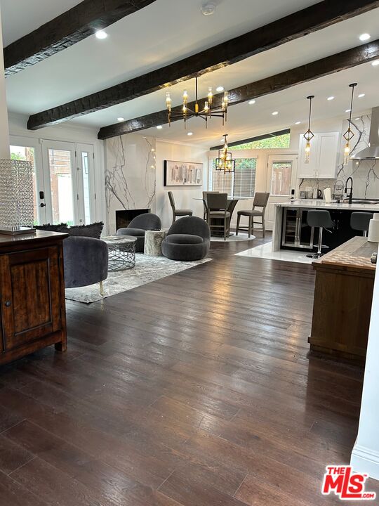 a lobby with furniture and floor to ceiling window